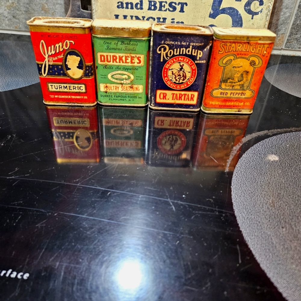 Antique spice cans